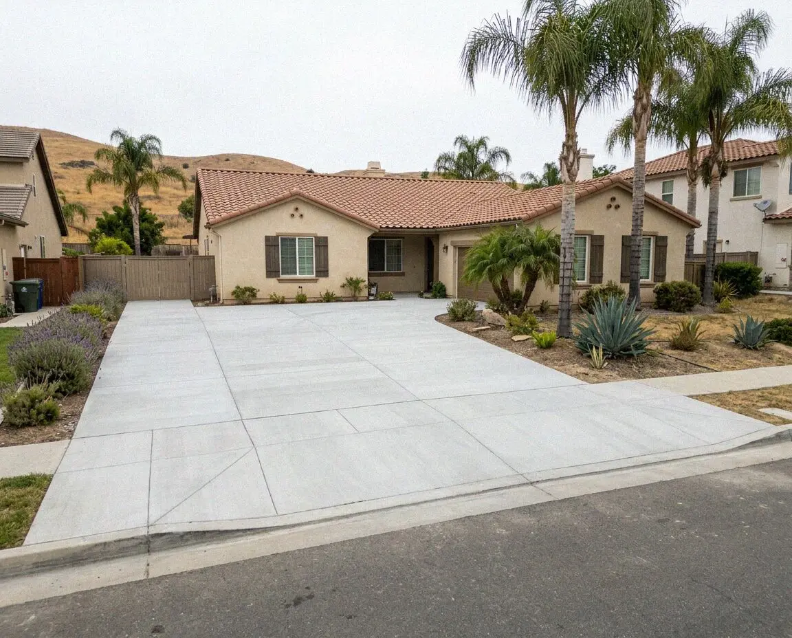 Newly poured concrete driveway at a Huntington Beach tract home